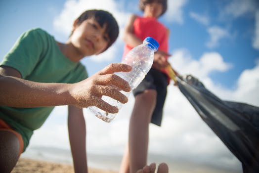 kids picking up litter in a park