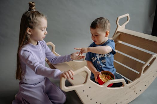 Happy children sharing toys