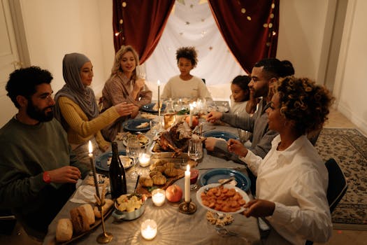 family sitting around a dinner table, engaging in conversation