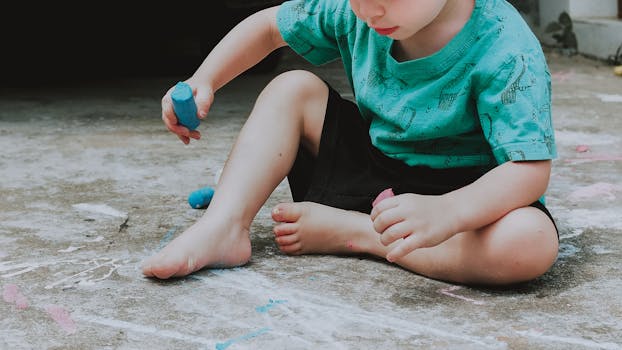 toddler having fun drawing