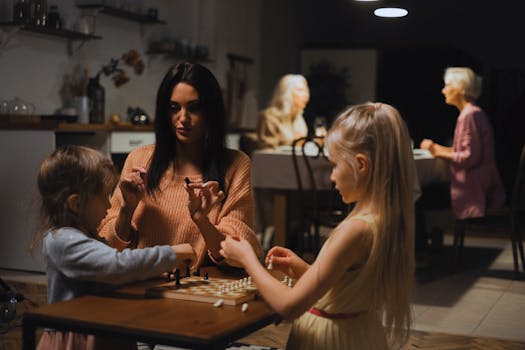 A family gathered around a table, engaging in a fun conversation game