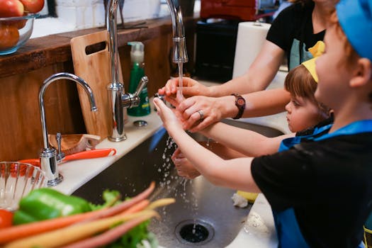 child washing hands with soap